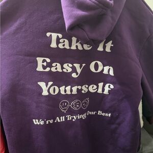 Two Plain Purple Hoodie with White Text on Back